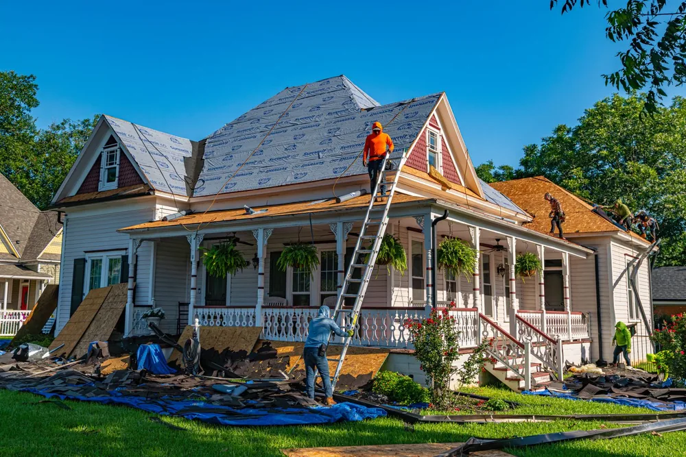 Roof repair work on a detached house